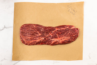 London Broil steak on butcher paper