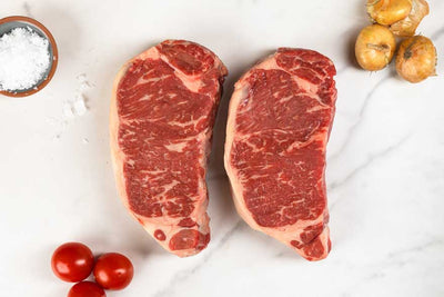 Boneless Dry-aged Strip Steak with background image
